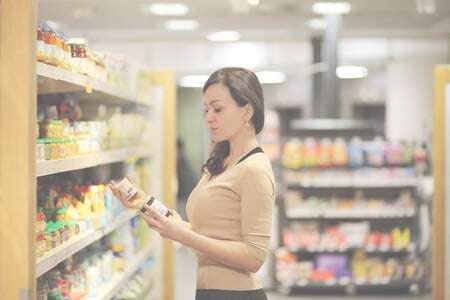 woman comparing supplements